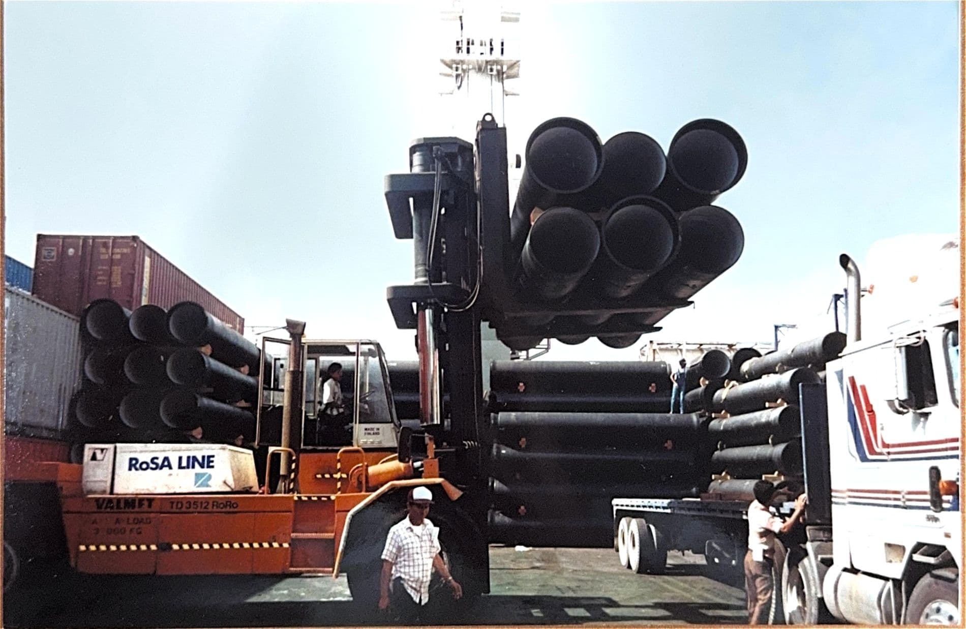 Forklift moving materials at port